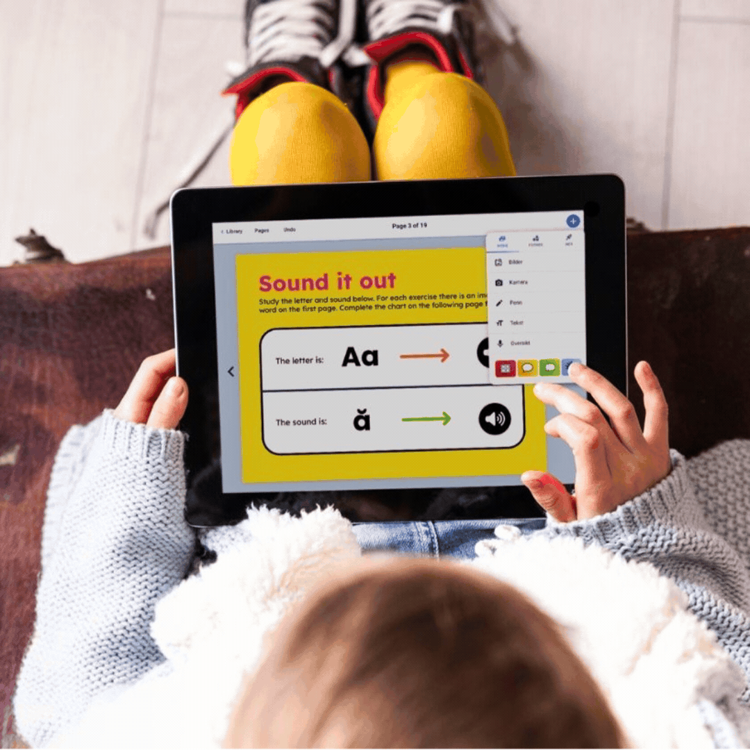 young student using Book Creator to learn phonics on an tablet