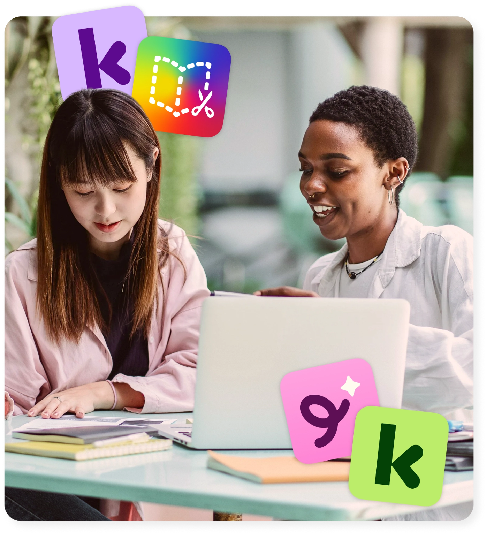 Two instructional coaches plan together at a laptop, supported by the Kami family of products.
