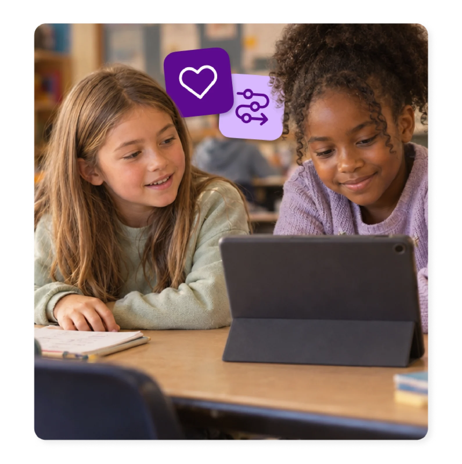 Two students work together on a tablet as progress monitoring tools make their learning visible.