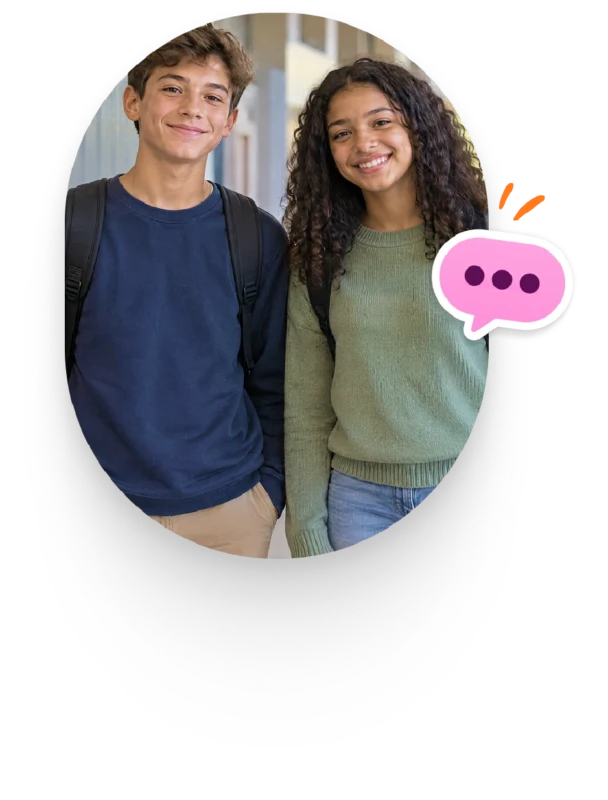 Two smiling middle school students wearing backpacks stand side by side in a bright school hallway.