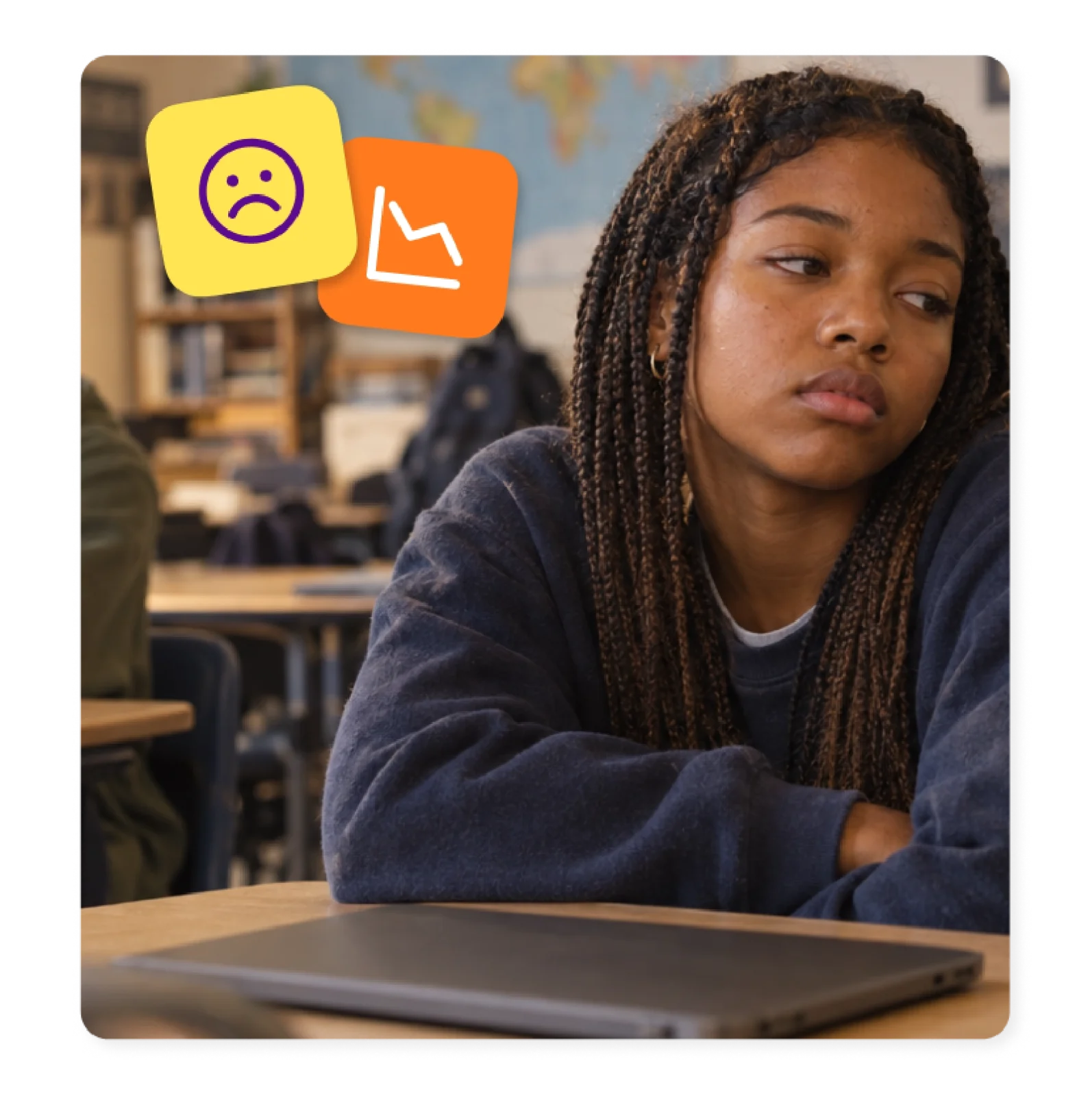 A student looks away from her closed laptop, showing the gap an AI grading tool for teachers can close.